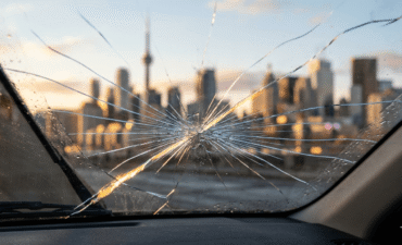 windshield crack repair Toronto — spreading crack on car glass
